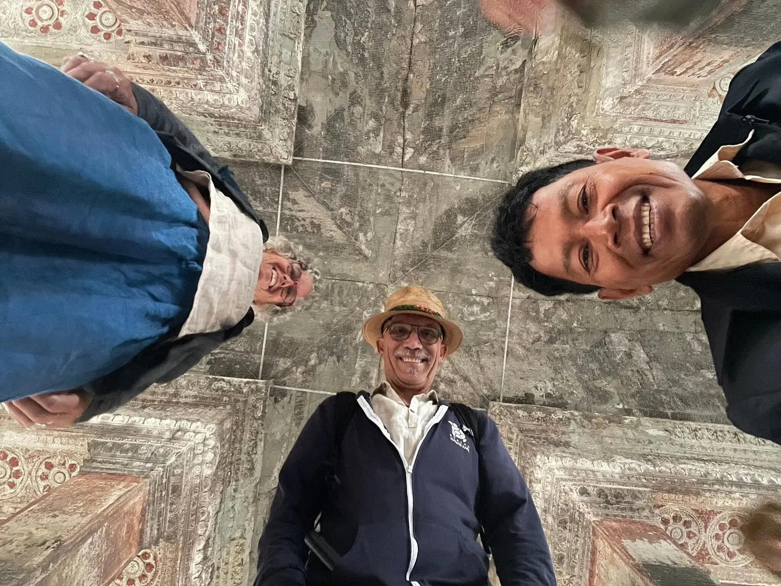 A playful upside-down perspective photo San took of a guest at Angkor